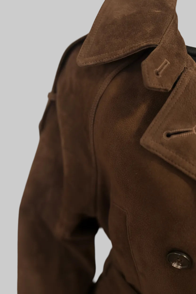 Close up of the suede texture, lapel and button on the JJerrold chocolate brown suede trench coat